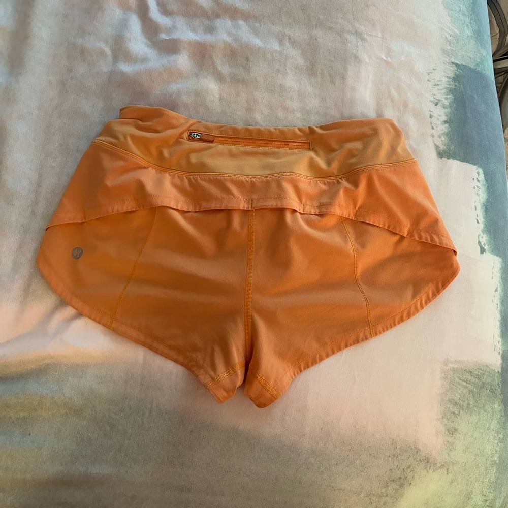 Orange lululemon speed up shorts